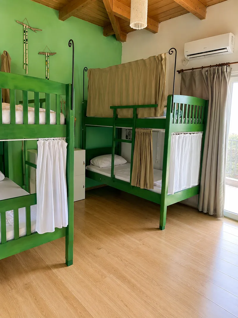 Four-bed dormitory at Trip'N'Hostel Seaside with balcony