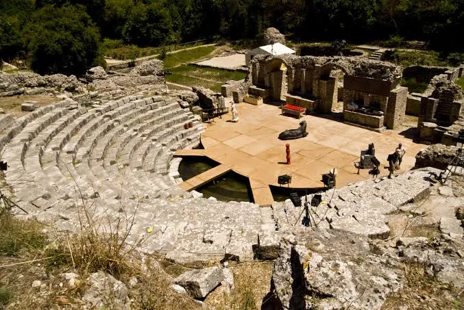 Butrint UNESCO World Heritage site — ancient ruins surrounded by dense forest and lagoon