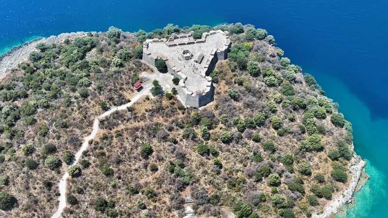 Kalaja e Porto Palermos castle on a rocky peninsula overlooking the Ionian Sea